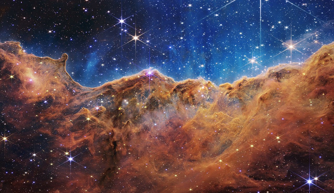 Webb’s infrared view of the Cosmic Cliffs in the Carina Nebula